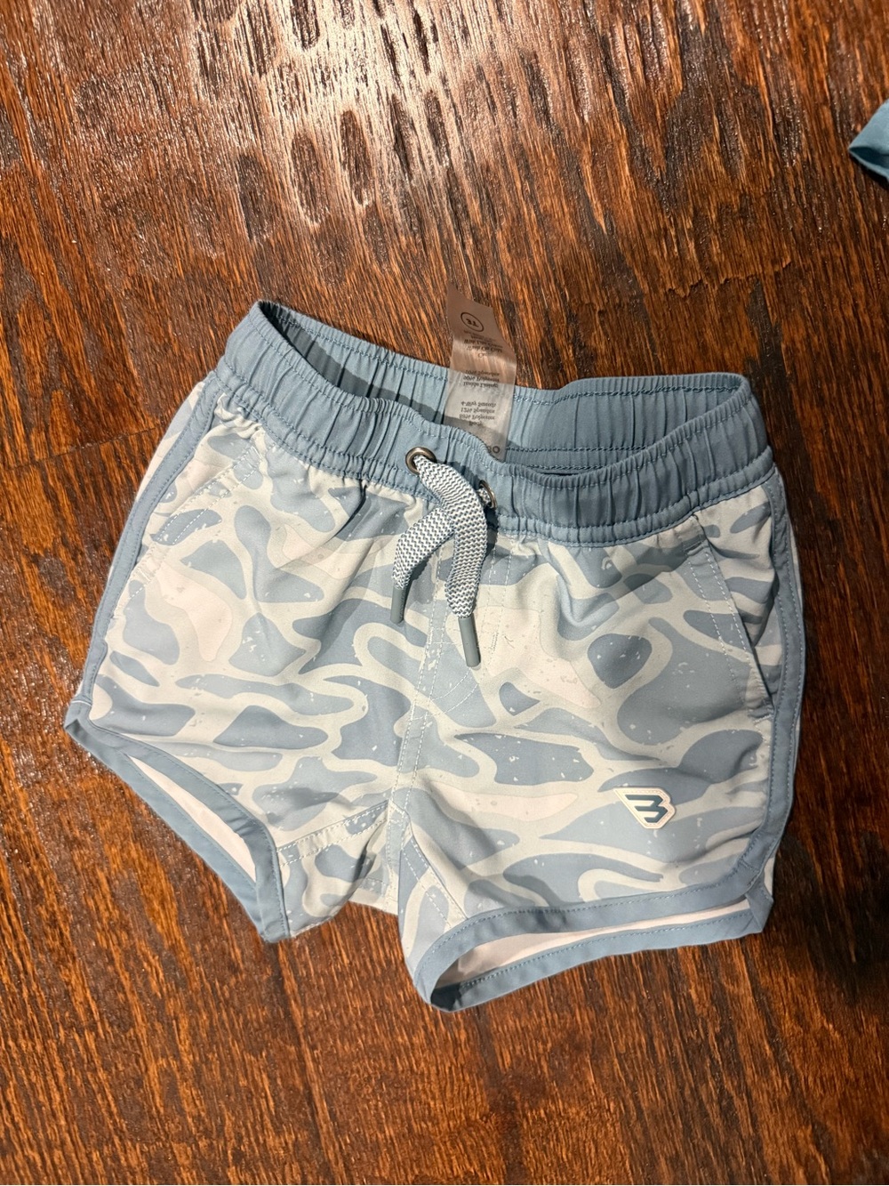 BURLEBO Light Blue and White Camouflage Kids Swim Trunks